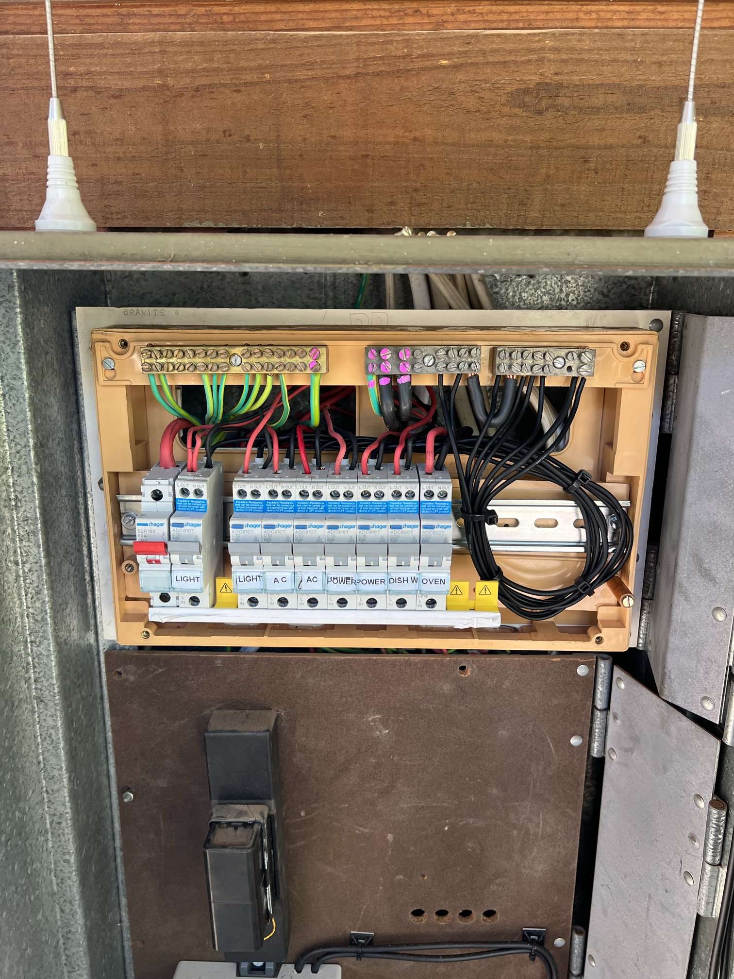 Outdated switchboard assessed by electrician prior to switchboard upgrade
