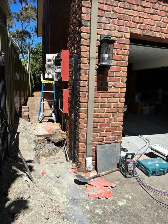 Consumer mains repairs with electrician services for electrical systems, switchboards and safe power supply. Technician performing consumer mains repairs in Adelaide